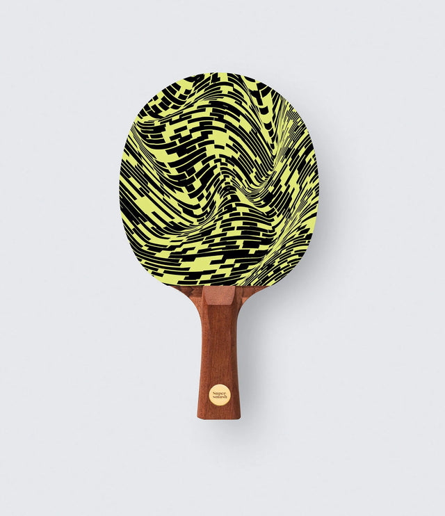 Table tennis paddle with a black and yellow pattern on a white background