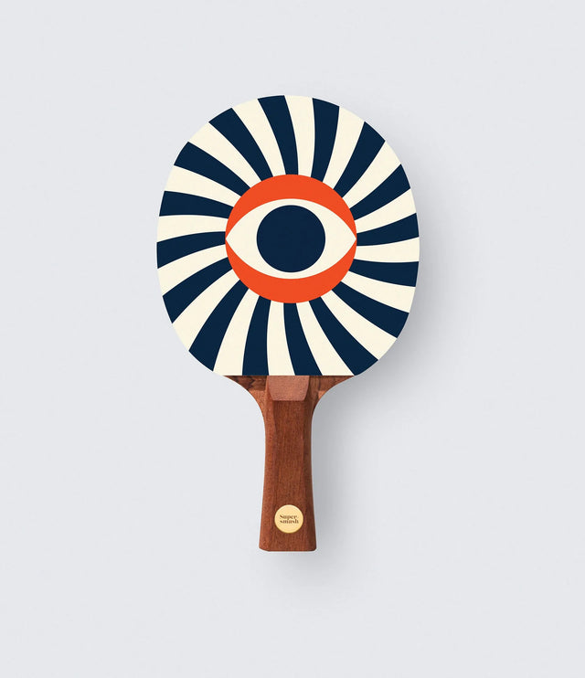 Ping pong paddle with a striped design on a light gray background