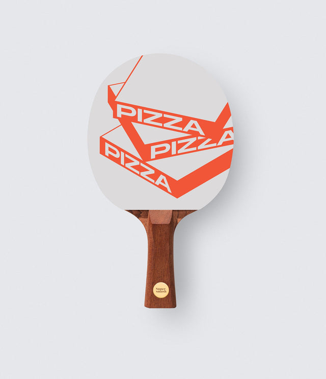 A ping pong paddle with a white and orange 'Pizza' brand design on the paddle's surface, with a wooden handle.